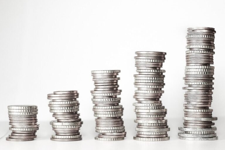 stacked coins image - Automated personal finance system